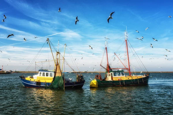 Fishing trawlers at work — Stock Photo, Image