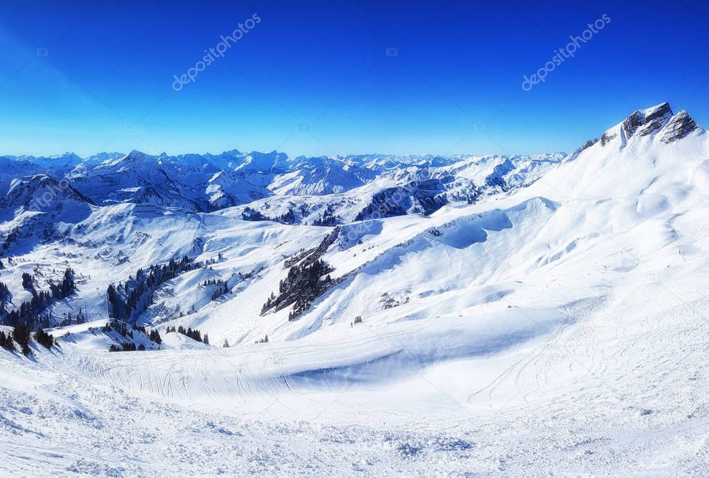 Panorama view of a snowy mountain landscape in the sunlight  Damls Vorarlberg Austria