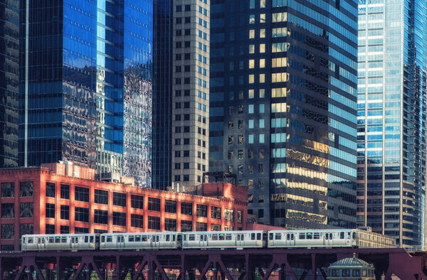 City of Chicago skyscrapers with elevated train.