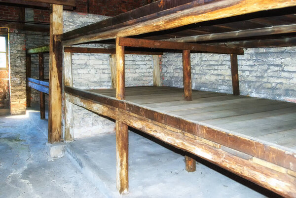 Prisoner's beds, bunks inside barrack in Auschwitz Birkenau Muse