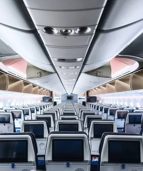 Cabin interior of a modern passenger aircraft (wide body) — Stock Photo, Image