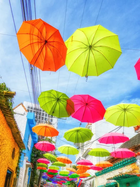An Alley full of colorful floating Umbrellas — Stock Image An Alley full of colorful floating Umbrellas Stock Image