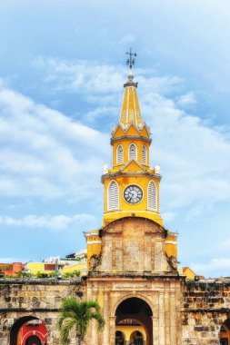 The Clock Tower in the entrance of the old town Cartagena, Colombia. clipart