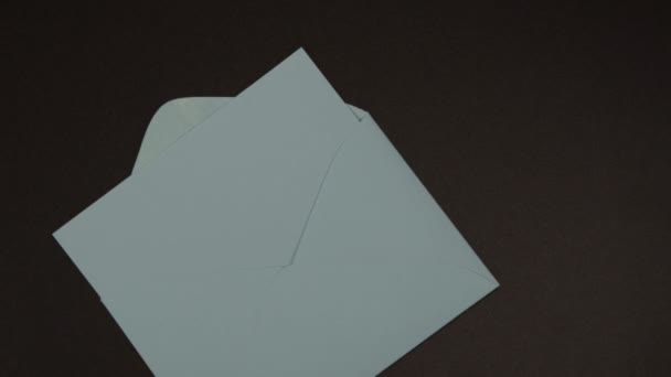 Female Hand Writes Pen Goodbye Paper Puts Blue Envelope Concept — Stock Video