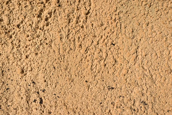 Piedras textura y fondo amarillo, superficie rocosa — Foto de Stock