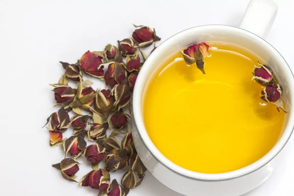 Taza de té rosa con rosa de té de yema —  Fotos de Stock