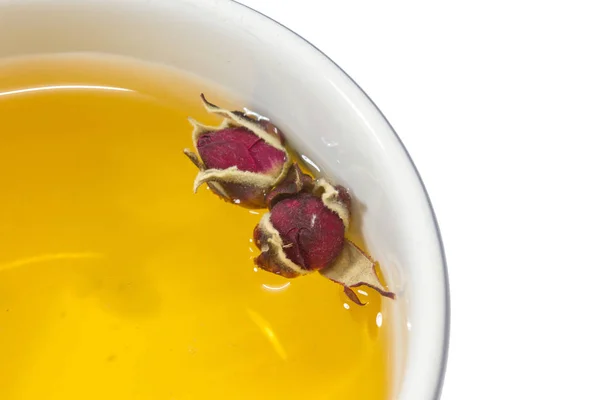 Taza de té rosa con rosa de té de yema —  Fotos de Stock