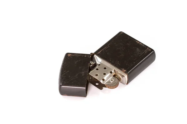 Old Cigarette lighter on white background closeup Stock Photo