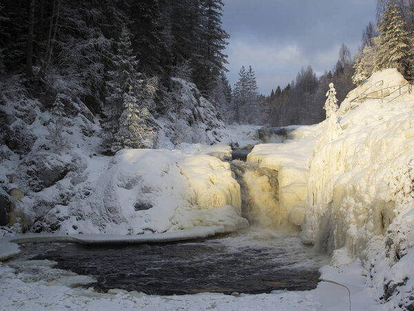 Kivach waterfall in the winter, Karelia, Northern Russia.