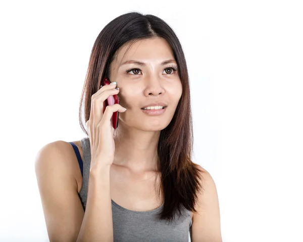 Asian woman talking on smartphone — Stock Photo, Image