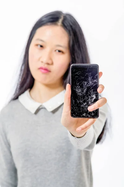 Asiatico studentessa con cracking cellulare — Foto Stock