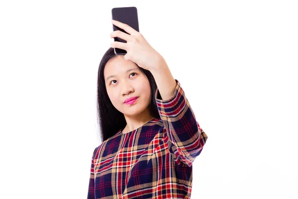 Asian teenage girl taking selfie — Stock Photo, Image