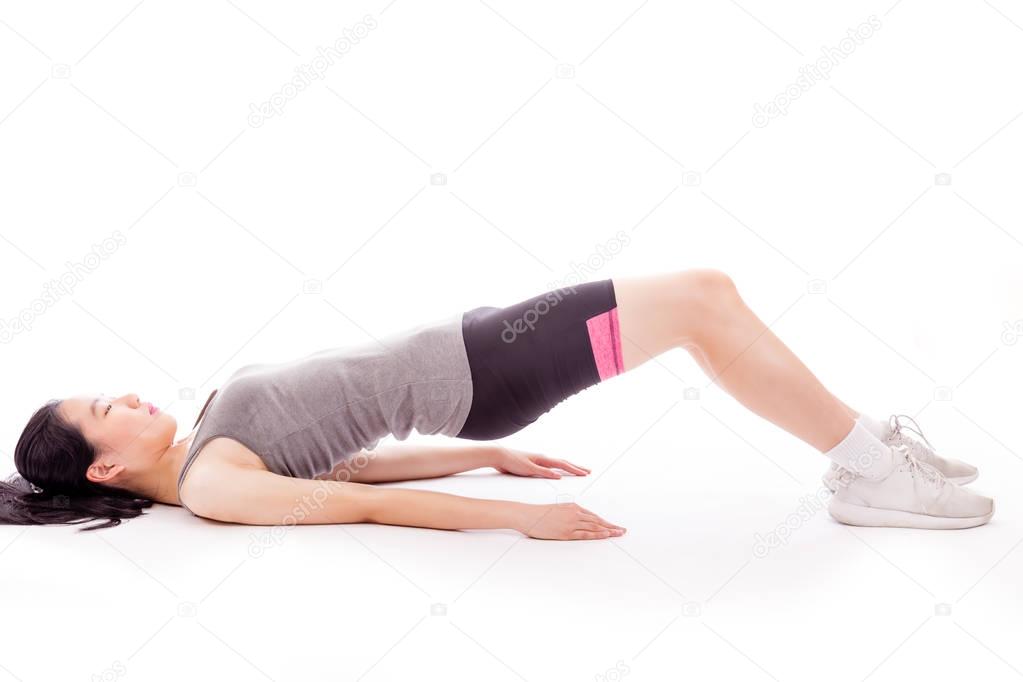 Asian teenager doing stretching exercise