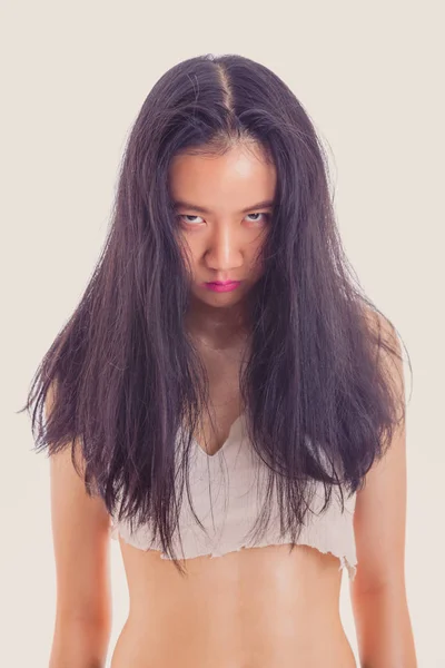 Fierce looking Asian teenage girl — Stock Photo, Image