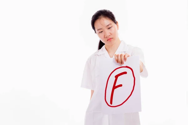 Menina do ensino médio chinês mostrando má pontuação teste — Fotografia de Stock
