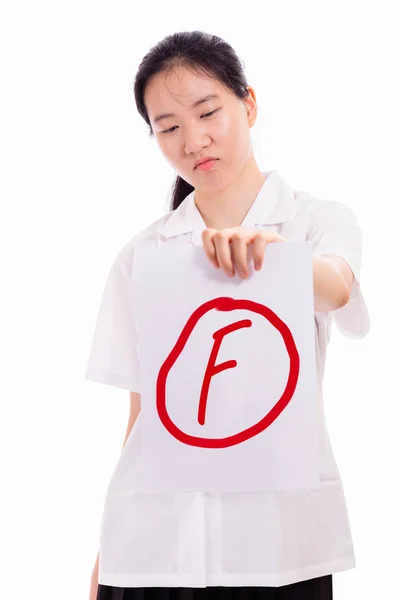 Menina do ensino médio chinês mostrando má pontuação teste — Fotografia de Stock