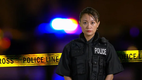 stock image Asian American Policewoman smiling at camera