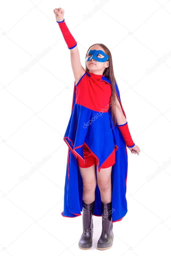Young girl in superhero costume