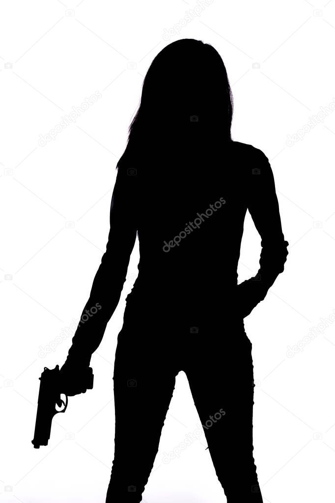 Silhouette of woman with handgun on white background