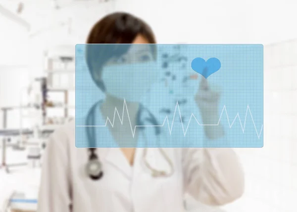 Defocused doctor pressing heart button on virtual interface — Stock Photo, Image