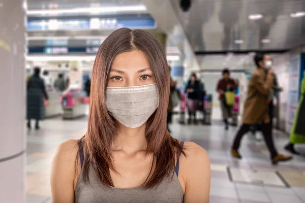 Chinese Woman Wearing Surgical Mask Defocused Japanese Metro Train Station — Stock Photo, Image