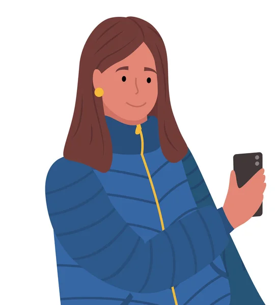 Frau in warmer Kleidung posiert mit Handy — Stockvektor