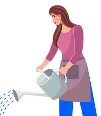 Çiftlik üniformalı genç bir kadın elinde bir su kovası tutuyor ve suluyor. Eko tarım kavramı