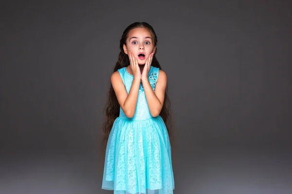 Little Amazed Girl Opened Her Mouth Palms Cheeks Graybackground Long Stock Photo