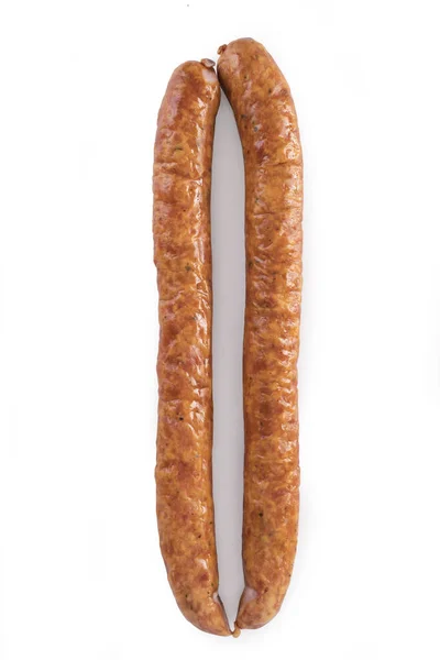 Saucisse fine sur fond blanc. Produits alimentaires . — Photo