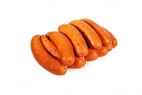 Thin sausage on a white background. Food product. — Stock Photo, Image