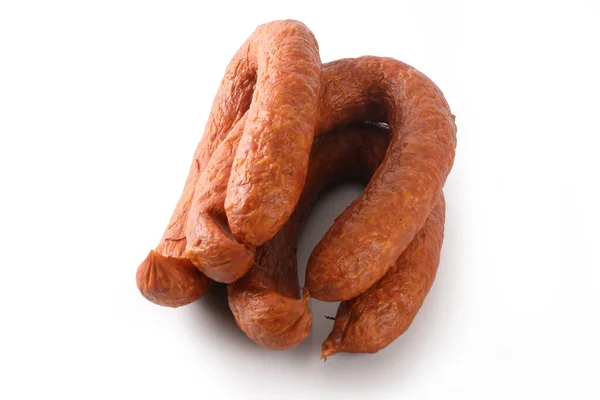 Saucisse fine sur fond blanc. Produits alimentaires . — Photo