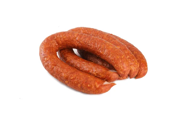 Dünne Wurst auf weißem Hintergrund. Lebensmittel. — Stockfoto