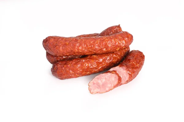 Trockenwurst auf weißem Hintergrund. Lebensmittel. — Stockfoto