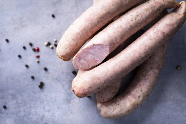 Traditional country homemade sausage on a stony background. — Stock Photo, Image