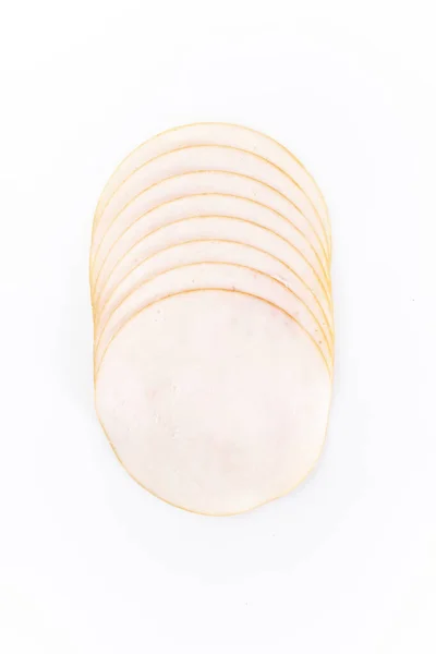 Poultry cold cuts cut into slices, isolated on white background, top view. — 스톡 사진