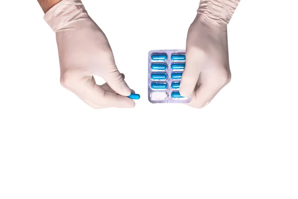 Male doctors hands in rubber gloves holding an ampule of insulin on white backgound isolated. Concept sterility purity. — Stock Photo, Image