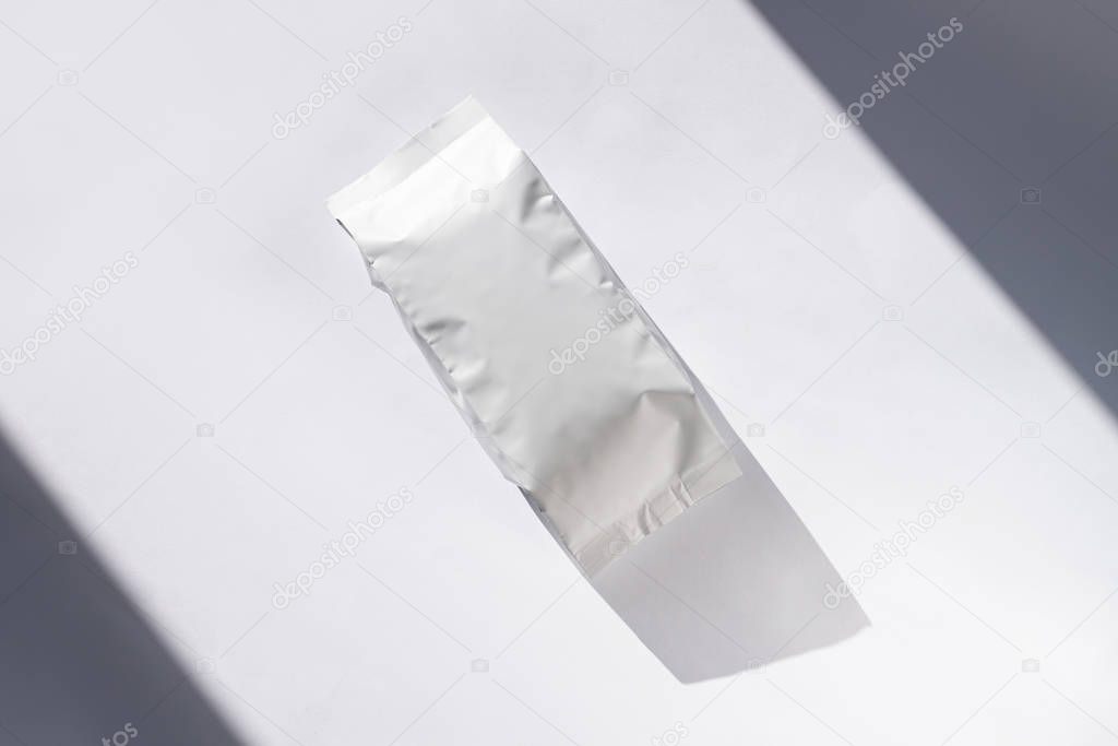 Blank foil pouch bag isolated on white background.