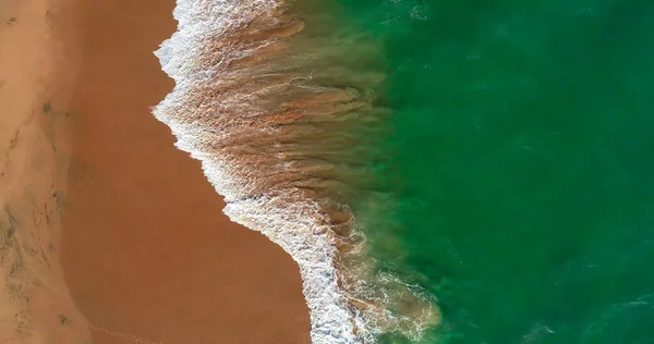 Sea Aerial view, Top view,amazing nature background.The color of the water and beautifully bright.Azure beach with rocky mountains and clear water flying drone,sea view