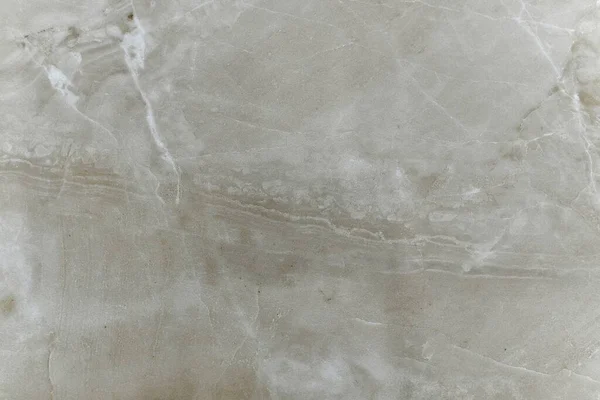Natural beige polished marble with with an oblique wide horizontal stripe and small rough dashes. — Stockfoto