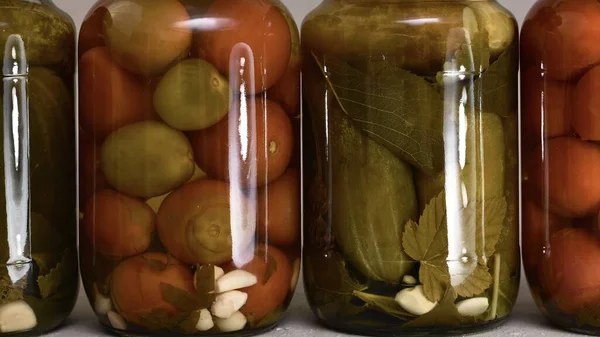 Fermented Vegetables Background Row Jars Cucumbers Tomatoes Close Gray — Stock Photo, Image