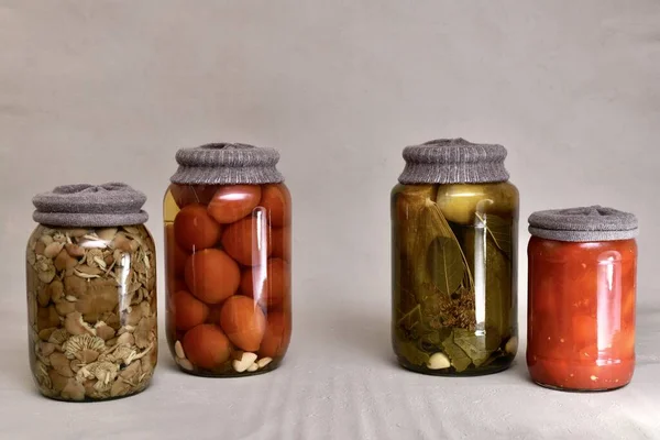 Diagonal Row Four Glass Jars Rust Proof Knitted Lids Filled — Stock Photo, Image