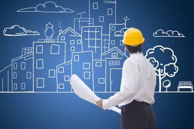 Planları ve el şehir çizimi kontrol inşaat işçisi. c
