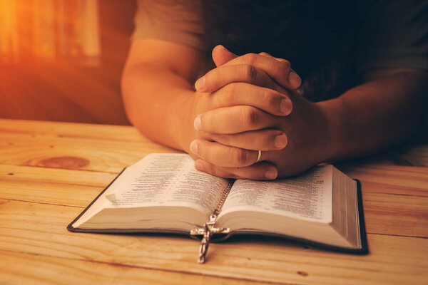 Christian hand while praying and worship for christian religion 