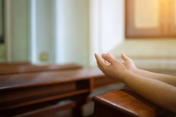 Woman hands are worship christian god while in church. Eucharist — 스톡 사진