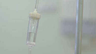 the medicine is dripping in the infusion system