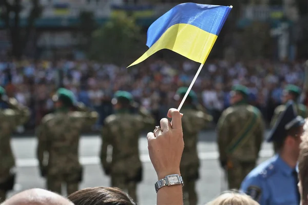 Ukraine small flag in hands — Stock Photo, Image
