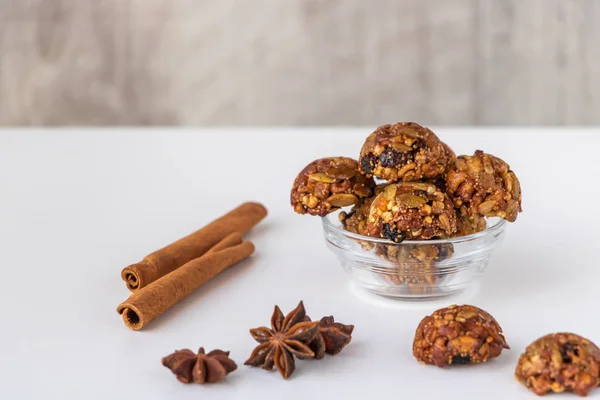 Homemade energy and healthy sweets made from cereals, quinoa, dried nuts, seeds, dried fruits and honey. Cereal crunchy sweet snacks. Homemade useful candies. Raw and vegan sweets.