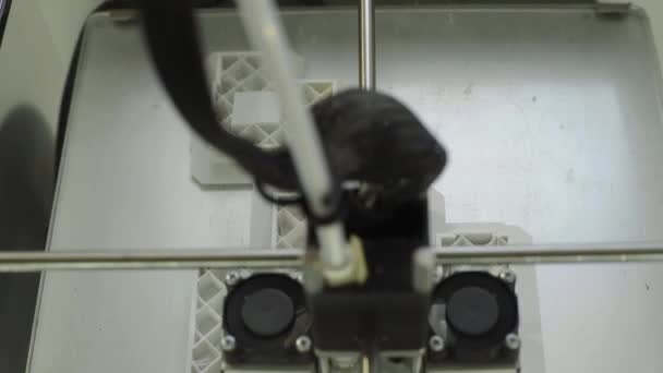 Technology. The work of a three-dimensional printer. 3D printer during printing close-up. Process of working 3D printer. — Stock Video