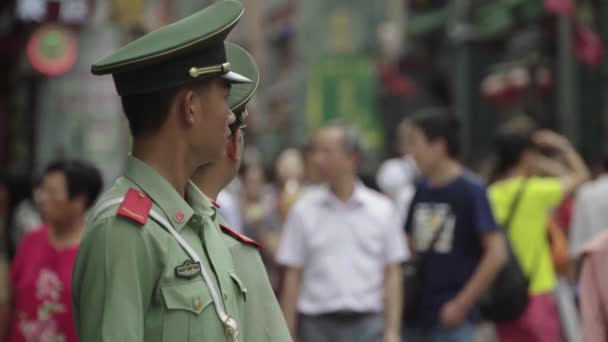 The man is a policeman. Beijing. China. Asia — Stock Video