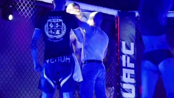 A male fighter in the MMA octagon. Kyiv. Ukraine — Stock Video